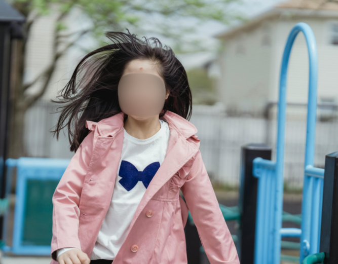 young girl with jacket