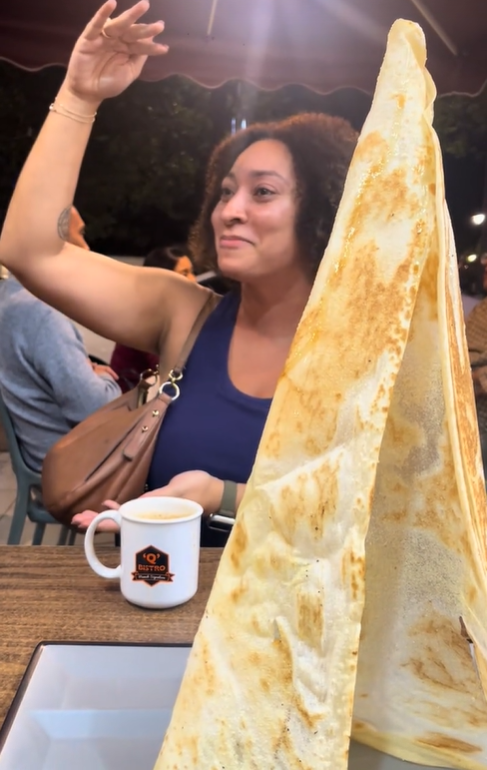 Zahra laughing at roti tisu 2