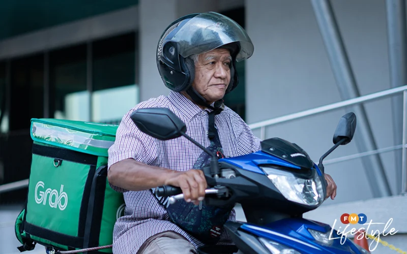 70yo grab rider zakaria abdul wahab on the job