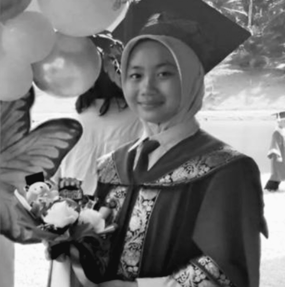 Zara Qairina in graduation clothing